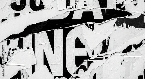 Torn paper with black and white text, abstract grunge background