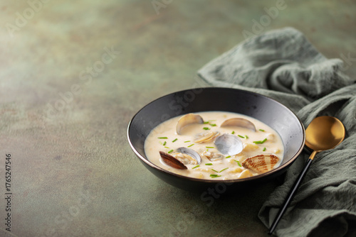 Clam chowder. Traditional American cream soup. In addition to clams, common ingredients include diced potatoes, carrots, and onions