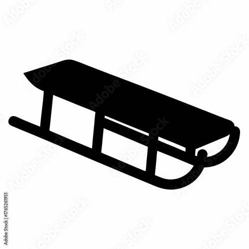 A black sled for winter fun and recreational activity in snowy conditions