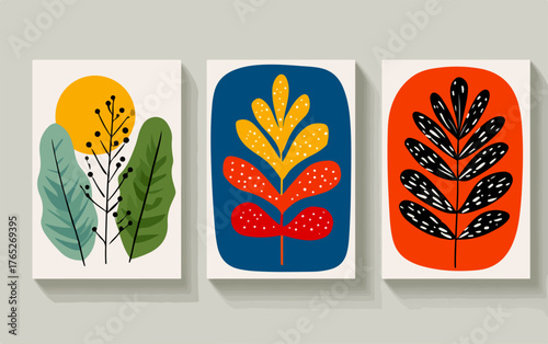 Abstrakcyjne obrazy z motywami roślinnymi i geometrycznymi w żywych kolorach tworzą stylową dekorację ścienną.