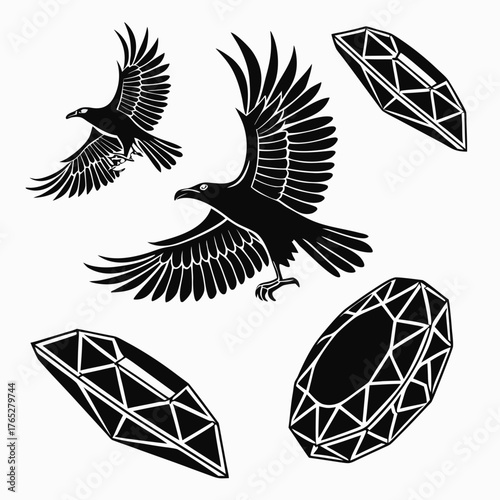 Black eagles and faceted gemstones on white background