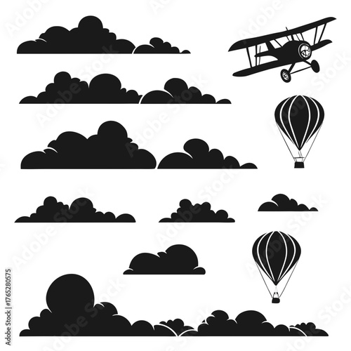 Black silhouette clouds biplane and hot air balloons