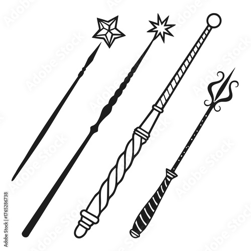 Four black magic wands with different tips and handles