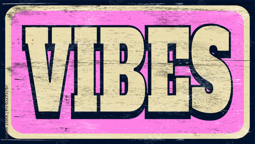 Aged and worn vibes sign on wood