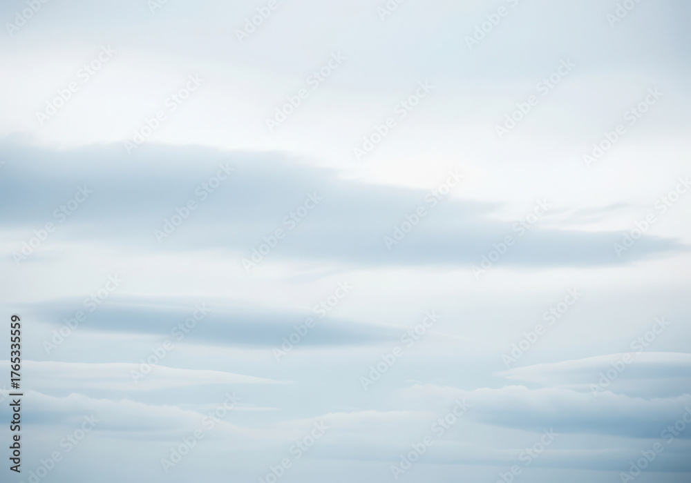 Fototapeta premium Abstract watercolor painting with soft blended washes of sky blue and white painterly textures