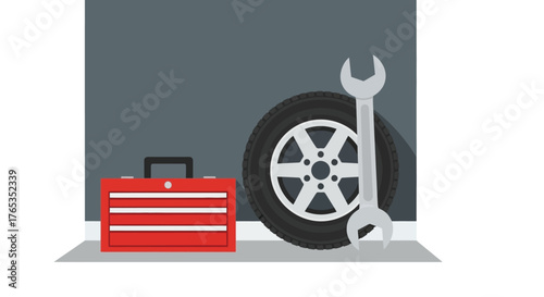 Car tire and toolbox with wrench, ready for repair and maintenance