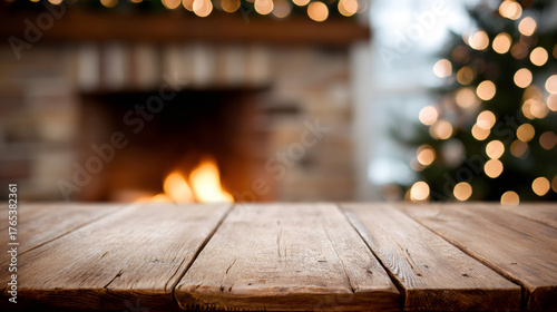 Empty wooden table with christmas fireplace background