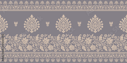 Elegant ethnic pattern with floral and ornamental design in beige on muted purple background creating classic decorative pattern