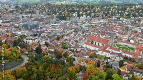 Drone Aerial Footage of autumn saint gallen city in switzerland with cathedral and beautiful trees 