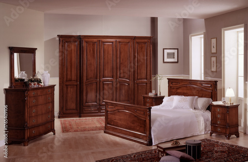 Single shot photo of a classic style wooden bedroom environment