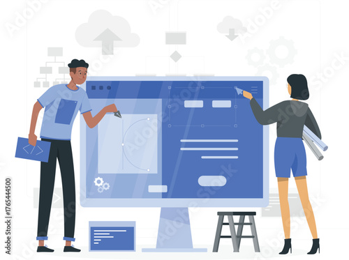 Two designers collaborating on a website interface on a large computer screen web design development