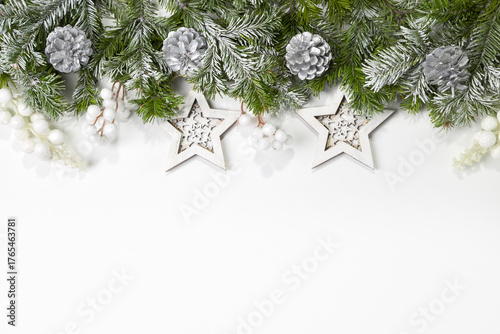 Christmas card with fir branches and Christmas decorations