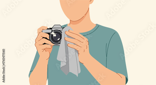 Proper Camera Maintenance Person cleaning photographic equipment with a soft cloth, demonstrating essential care for lens and body
