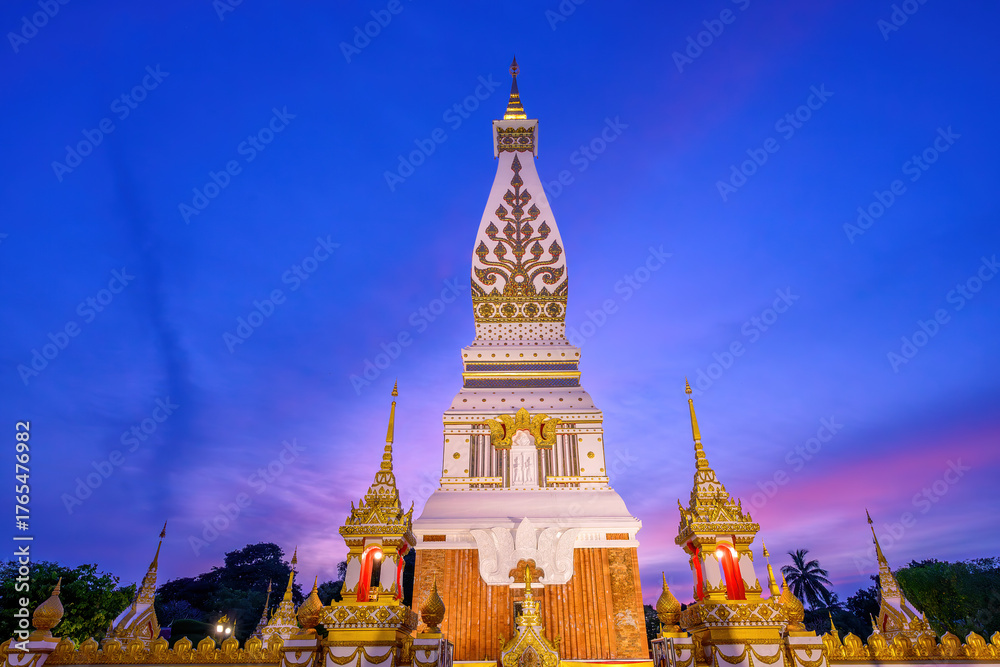 Naklejka premium The beautiful Phra That Phanom at twilight at Wat Phra That Phanom, That Phanom District, Nakhon Phanom, Thailand.
