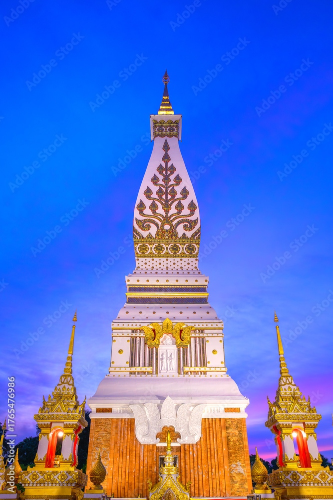 Fototapeta premium The beautiful Phra That Phanom at twilight at Wat Phra That Phanom, That Phanom District, Nakhon Phanom, Thailand.
