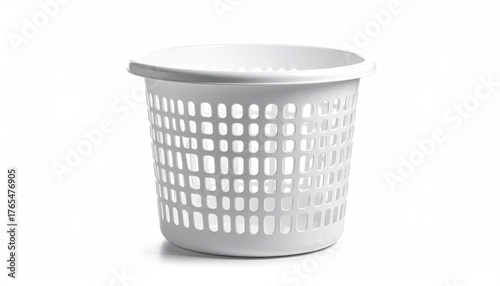 Round white plastic laundry basket on white