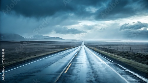 Dramatic rainy road landscape with a long straight road leading into the distance under a stormy sky, capturing the essence of travel and weather
