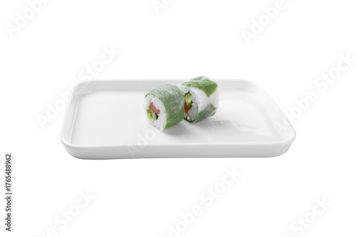 healthy sushi rolls with salmon avocado and cabbage wrap isolated on white