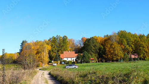 Vishtynetsky Forest in autumn. A forest holiday home, a cozy tourist base on the edge of the Red Forest. Vacations in the Kaliningrad Region, tourism in Russia.