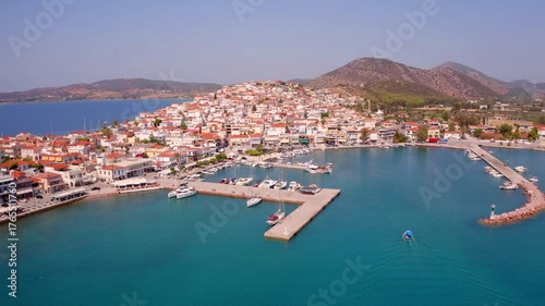 Bright summer cityscape of Ermioni port. Sunny morning seascape of Ionian sea. Amazing outdoor scene of Peloponnese peninsula, Greece, Europe. 4K video (Ultra High Definition).