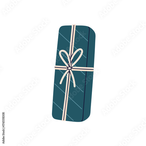 Gift box in festive paper wrapping, ribbon bow decoration. Abstract holiday p...