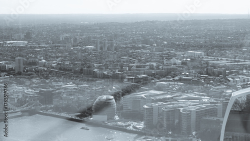 Monochrome aerial view of London city and Thames river.