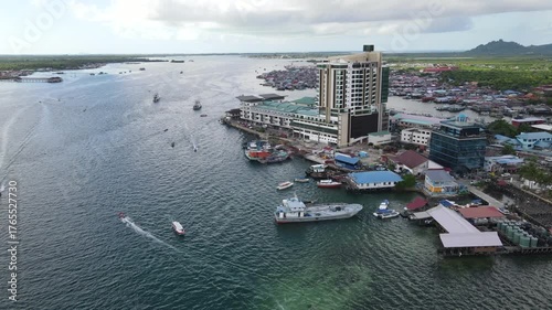 Aerial footage view of commercial pier and fisherman village at Semporna, a city on east coast of Sabah in Malaysia, Tawau District, Borneo island
