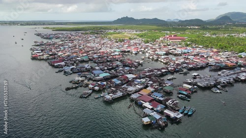 Aerial footage of traditional fisherman village at Semporna, a city on east coast of Sabah in Malaysia, Tawau District, Borneo island