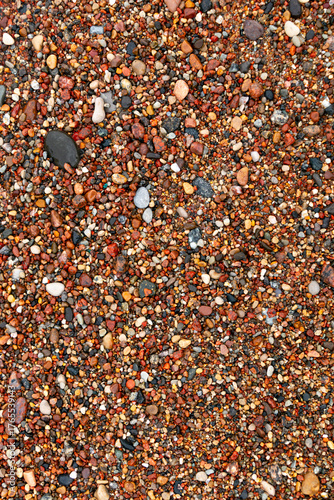 colorful pebbles on the seashore, top view