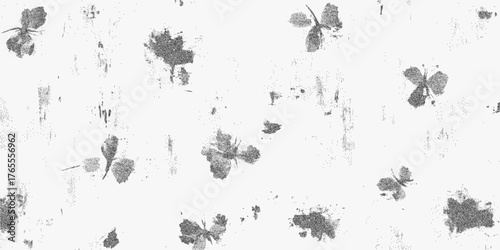 Repeating grunge pattern with faded flower prints, stippled textures, halftone dust, grainy noise and vintage surface wear on worn-out paper tone.
