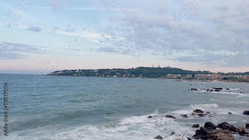 Mediterranean sea and landscape captured in famous summer village called Antibes in French riviera. It is a summer day.