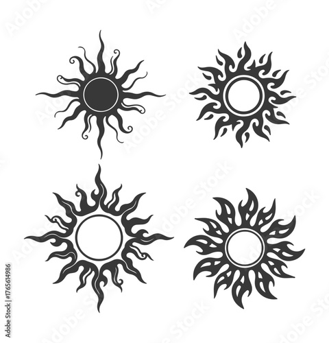 Set of four tribal sun vector icons. Black and white stylized sun symbols with flames for tattoo or logo.