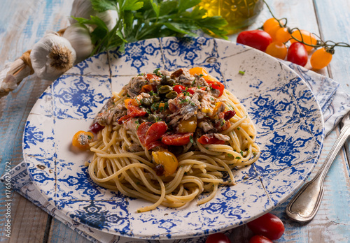 spaghetti with fresch anchovy  tomato and capers