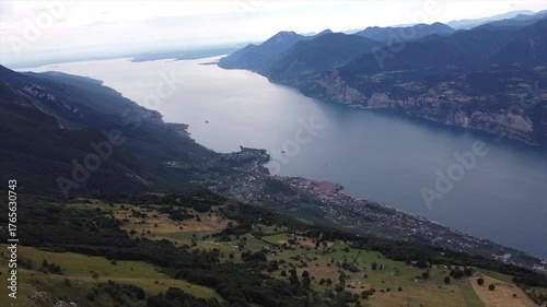 Northern Italy mountain lake under cloudy sky