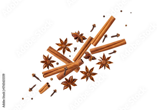 Dynamic Arrangement of Aromatic Spices: Cinnamon Sticks, Star Anise, and Cloves Isolated on White