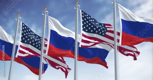 National flags of Russia waving in the wind on a clear day