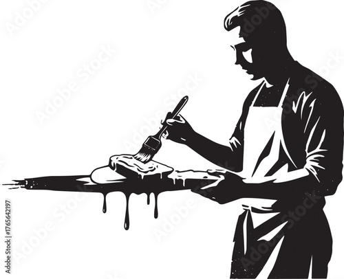 Monochromatic depiction of a man brushing butter on bread with a