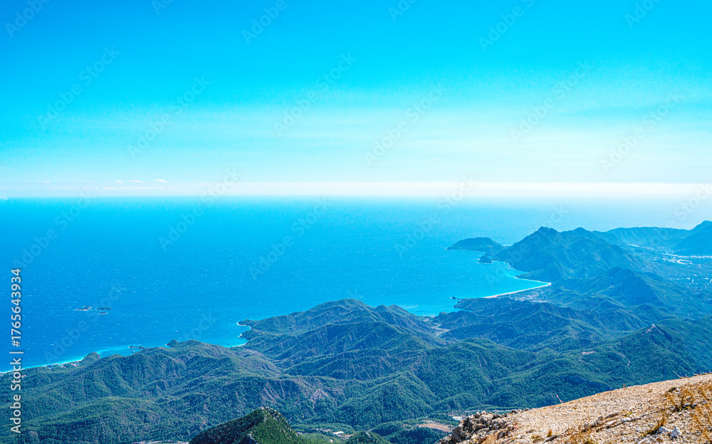 Obraz premium The scenic views of the Tahtalı Montain (Tahtalı Dağı), also known as Lycian Olympus with a height of 2365 meters near Kemer, in Antalya, Turkey.