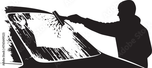Silhouette of person cleaning a car windshield with a squeegee t