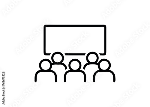 Group of people watching a screen