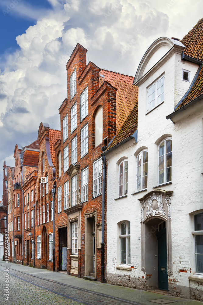 Fototapeta premium Street with historical houses in Lubeck, Germany