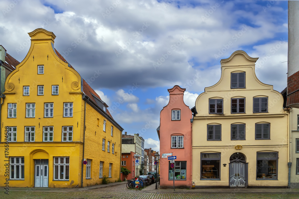 Fototapeta premium Street with historical houses in Lubeck, Germany