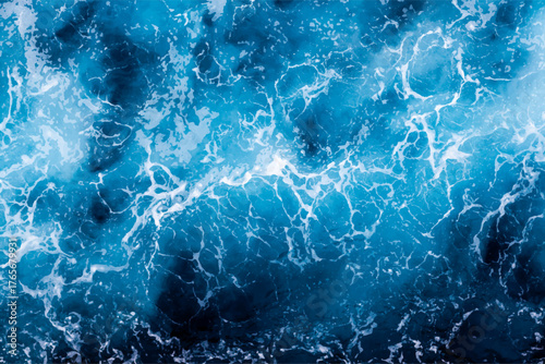 Ocean water background. Top view of stunning foamy water. Can be used in covers, packaging, posters, textures, banners, art and design projects. Creative vector illustration.