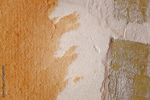 Εκτύπωση καμβά Close-up of paper curling from pale beige plaster to reveal a patchy yellow undercoat with gritty adhesive
