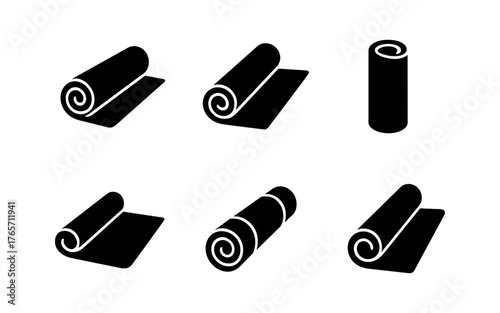 Silhouette icon set: rolled yoga and exercise mats in various positions