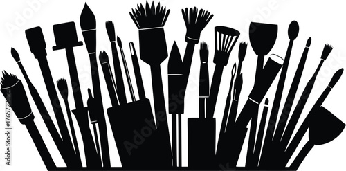 A diverse collection of artist paint brushes and tools arranged in a striking black silhouette against a white background silhouette