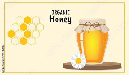 Organic honey jar on wooden stand with chamomile flower and honeycomb