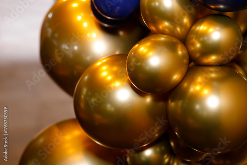 Vibrant golden and blue balloons elegant festive arrangement