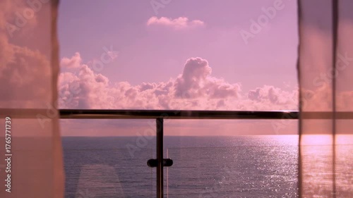 Relaxing Colorful Ocean View Through the Luxury Resort Window Balcony on the Beach in Sunlight Lilac Sky Pink Orange Clouds Sun at Sunrise 4K Fast Time Lapse. Sunset Bay Vacation Travel Island.