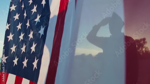 Waving USA Flag Over The Soldier Salute